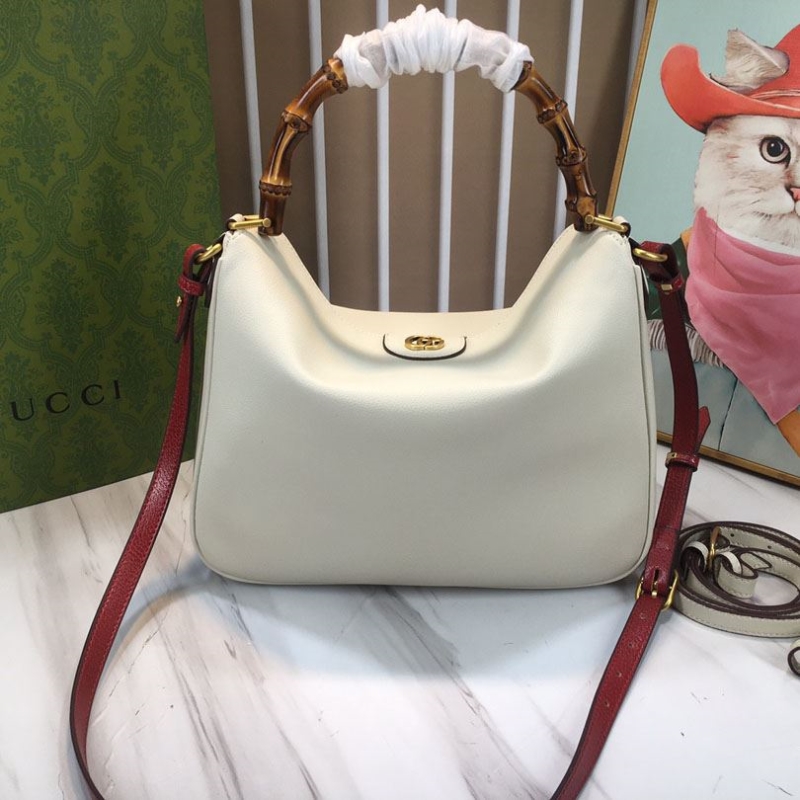 G*u*i top handle bags